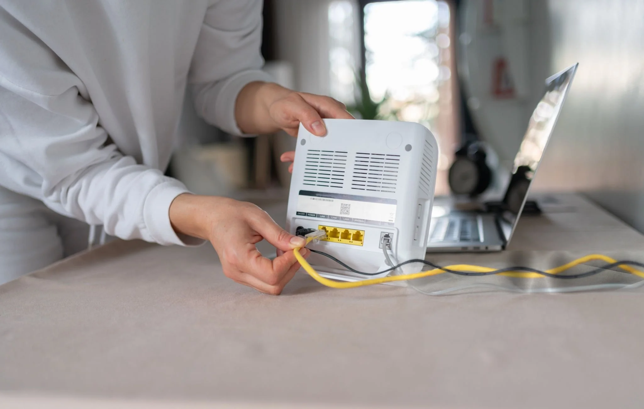Fiber internet problems and solutions concept with technician checking fiber connection
